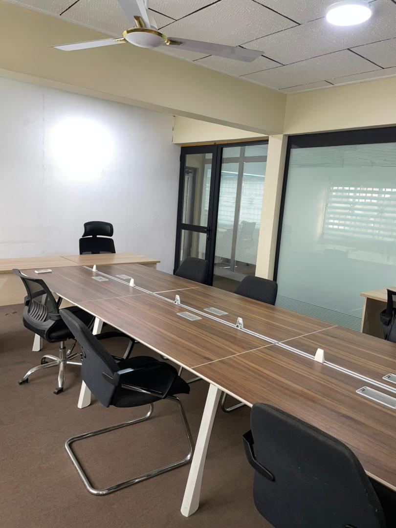 Opmax training and conference room with meeting tables and chairs
